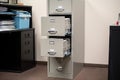 vertical file cabinet with labeled files and folders for easy access