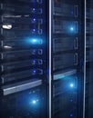 Vertical Format. Rows of server racks. Blue Technology Backfround. Royalty Free Stock Photo