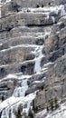 Vertical frame Bridal Veil Falls in Provo Canyon with snow ice and evergreen trees in winter Royalty Free Stock Photo