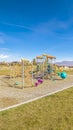 Vertical frame Corner perspective of a small kids playground Royalty Free Stock Photo