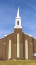 Vertical frame Exterior view of a magnificent church with cloudy blue sky background Royalty Free Stock Photo