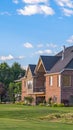 Vertical frame Luxury houses and golf course with mountain and blue sky in the background Royalty Free Stock Photo