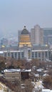 Vertical frame Panoramic view of the bustling Salt Lake City downtown on a cloudy winter day Royalty Free Stock Photo