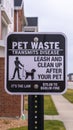 Vertical frame Pet Waste Transmits Disease warning notice day light