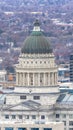 Vertical frame The Utah State Capital Building against downtown Salt Lake City during winter Royalty Free Stock Photo