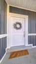 Vertical Front door and porch area of modern suburban home Royalty Free Stock Photo