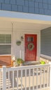 Vertical Front porch of traditional home and swinging chair Royalty Free Stock Photo