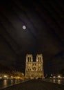 Notre Dame de Paris Cathedral under the moon light at night Royalty Free Stock Photo