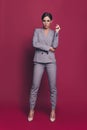 Vertical full length body size view portrait of her she nice classy pretty charming attractive bossy lady wearing gray Royalty Free Stock Photo