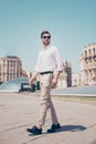 Vertical full-length portrait of serious handsome attractive virile masculine pensive foreigner wearing formal outfit white shirt Royalty Free Stock Photo