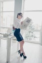 Vertical full length side profile body size photo she business lady eyewear eyeglasses hands arms fresh press reader