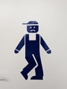 Vertical funny bathroom sign with blue male icon holding his pee