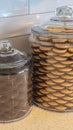 Vertical Glass storage jars filled with cookies in kitchen