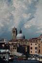 Vertical of Grand Canal with gondolas sailing along old buildings in Venice, Italy Royalty Free Stock Photo