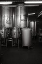 Vertical grayscale of fermenting vats in Ratsherrn Brauerei GmbH Craft beer Brewery