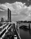 Vertical grayscale shot of a highway road and a modern building in Brisbane, Australia