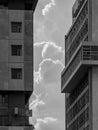 Vertical grayscale of a skyscraper in the capital of Costa Rica San Jose with twilight background