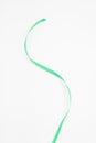 Vertical green wavy ribbon