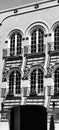 Vertical greyscale of the shadow of balcony fences of a building in San Francisco