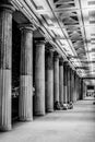 Vertical greyscale shot made from the inside of the Brandenburg Gate in Berlin