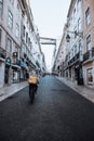 Vertical of a guy on a bike working as a Glovo delivery