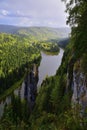 Vertical gypsum outlier Devil`s Finger next to the rocks of Usvinskie Pillars