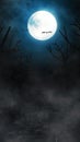 Vertical Halloween background with bats and pumpkins, graves, at misty night spooky with a fantastic big moon in the sky