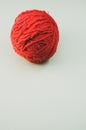 Vertical high angle shot of a ball of red yarn Royalty Free Stock Photo