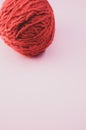 Vertical high angle shot of a ball of red yarn Royalty Free Stock Photo