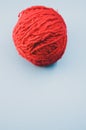 Vertical high angle shot of a ball of red yarn Royalty Free Stock Photo