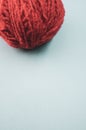 Vertical high angle shot of a ball of red yarn Royalty Free Stock Photo