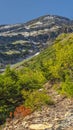 Vertical Hiking trail on Mount Tompanogos, Utah with snow