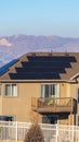 Vertical House with rooftop solar panels in Utah Valley Royalty Free Stock Photo