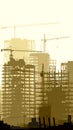 Vertical illustration of a construction site with cranes and buildings.