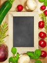Vertical illustration of a small framed black board with veggies around it for decoration