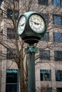 Vertical image of an antique street clock bearing the name Hartford National Bank and Trust