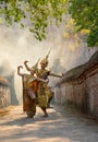 Vertical image of Asian man and woman wear Thai traditional dress and dance with beautifuul cultural style on the way with ancient Royalty Free Stock Photo