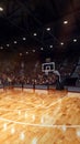Vertical image. 3D model of basketball court, arena with hoop. Empty basketball hall, playground with fans waiting Royalty Free Stock Photo