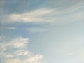 Vertical image of blue sky and white clouds on daytime. Royalty Free Stock Photo