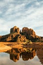 Vertical image of cathedral rock seen from secret slickrock with reflection of geological sandstone rock formations and spires