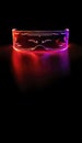 Vertical image, close up eyeware goggles colorful neon light, futuristic digital innovation concept, glow in dark background, Royalty Free Stock Photo