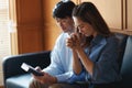 Vertical image. Close up woman holding the cross. Asian woman praying for blessings to Jesus It is the confession of sins before