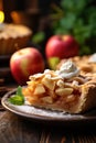 vertical image closeup of a piece of delicious homemade sweet apple pie on wooden background