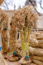 Vertical image of Didukh as a Ukrainian Christmas symbol on souvenir market - sheaf of wheat used for celebrating