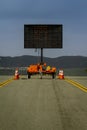 Vertical image of a Digital Road Sign stating Use Alternate Routes Royalty Free Stock Photo