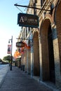 Long line of storefronts and signs announcing each business, downtown Austin, Texas, 2018