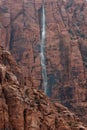 Vertical image of ephemeral waterfall during heavy rain in the American desert