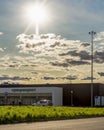 Vertical image of a family supermarket building in city in summer