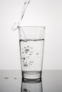 Vertical image glass of water on grey background