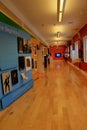 Vertical image of hallway exhibit covering life of Mark Morris, Museum of Dance, Saratoga, NY, 2016